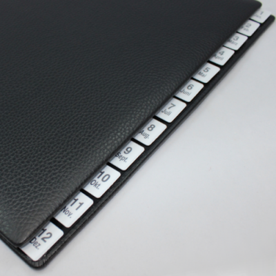Monthly desk folder with black grained leather cover