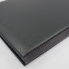 Monthly desk file sorter with black grained leather cover